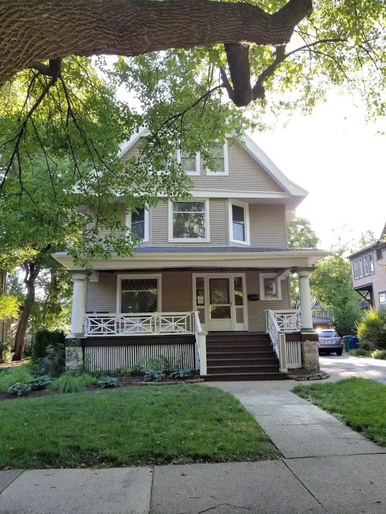 Neighborhood porch home in Elmhurst, Illinois with completed Durabuilt siding work earned through referrals