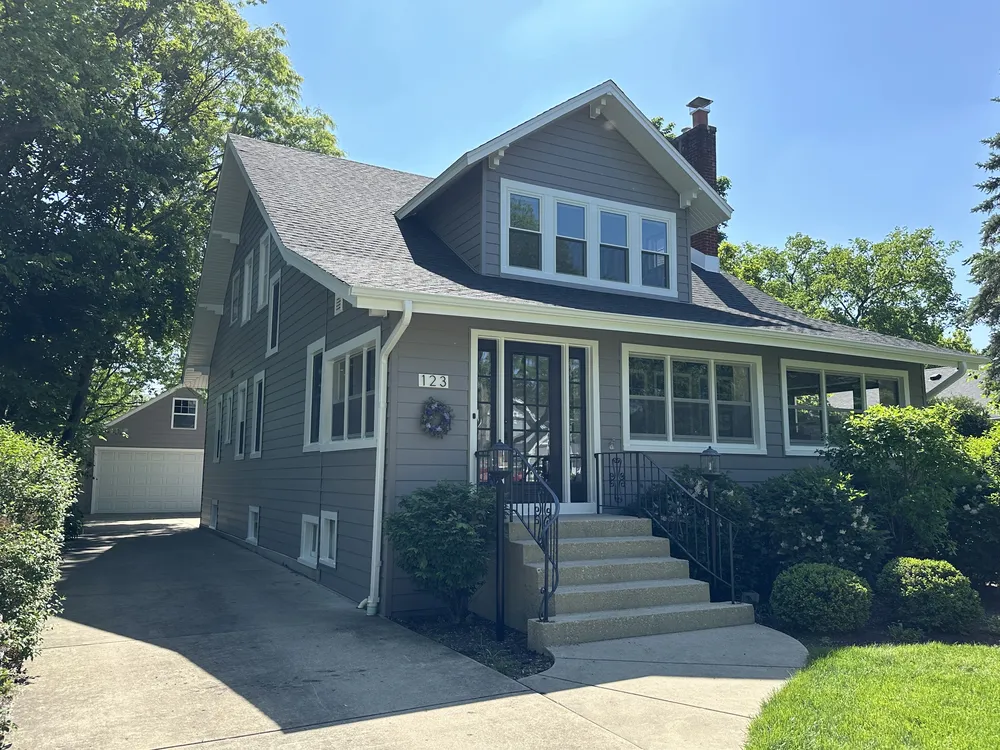 Front porch and siding of an Elmhurst, Illinois home after replacement by BBB-accredited Durabuilt Home Improvements