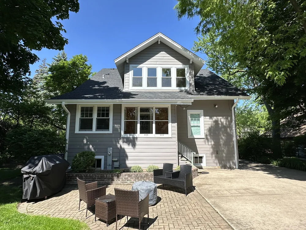 Driveway view of an Elmhurst, Illinois home after a competitively priced Durabuilt siding replacement