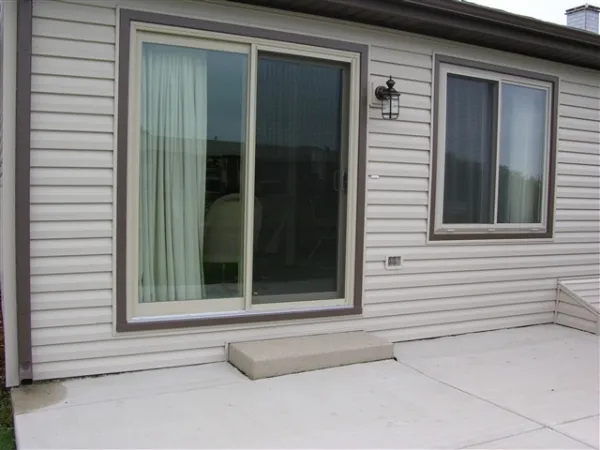 Patio door installation elmhurst sliding glass — completed home improvement project by Durabuilt Home Improvements in the Elmhurst, Illinois area