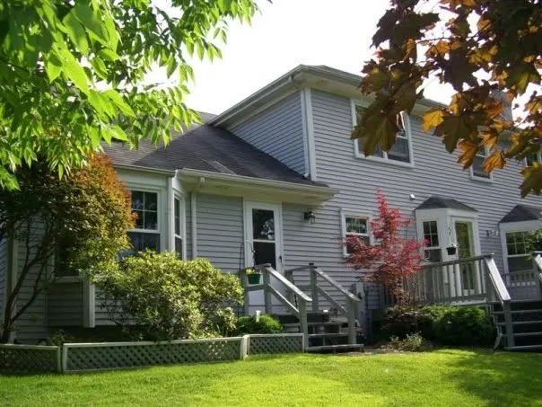 Rear deck and siding installation on a home in Elmhurst, Illinois by Durabuilt Home Improvements