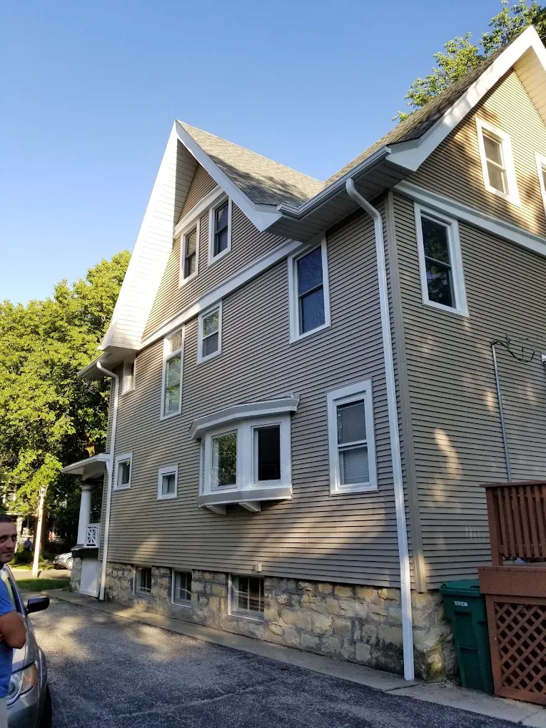 Close gable-side view of precise siding and trim workmanship on an Elmhurst, Illinois home
