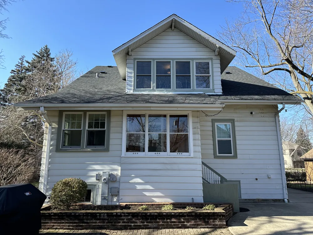 Dormer home in Elmhurst, Illinois before siding replacement, measured for a written Durabuilt estimate